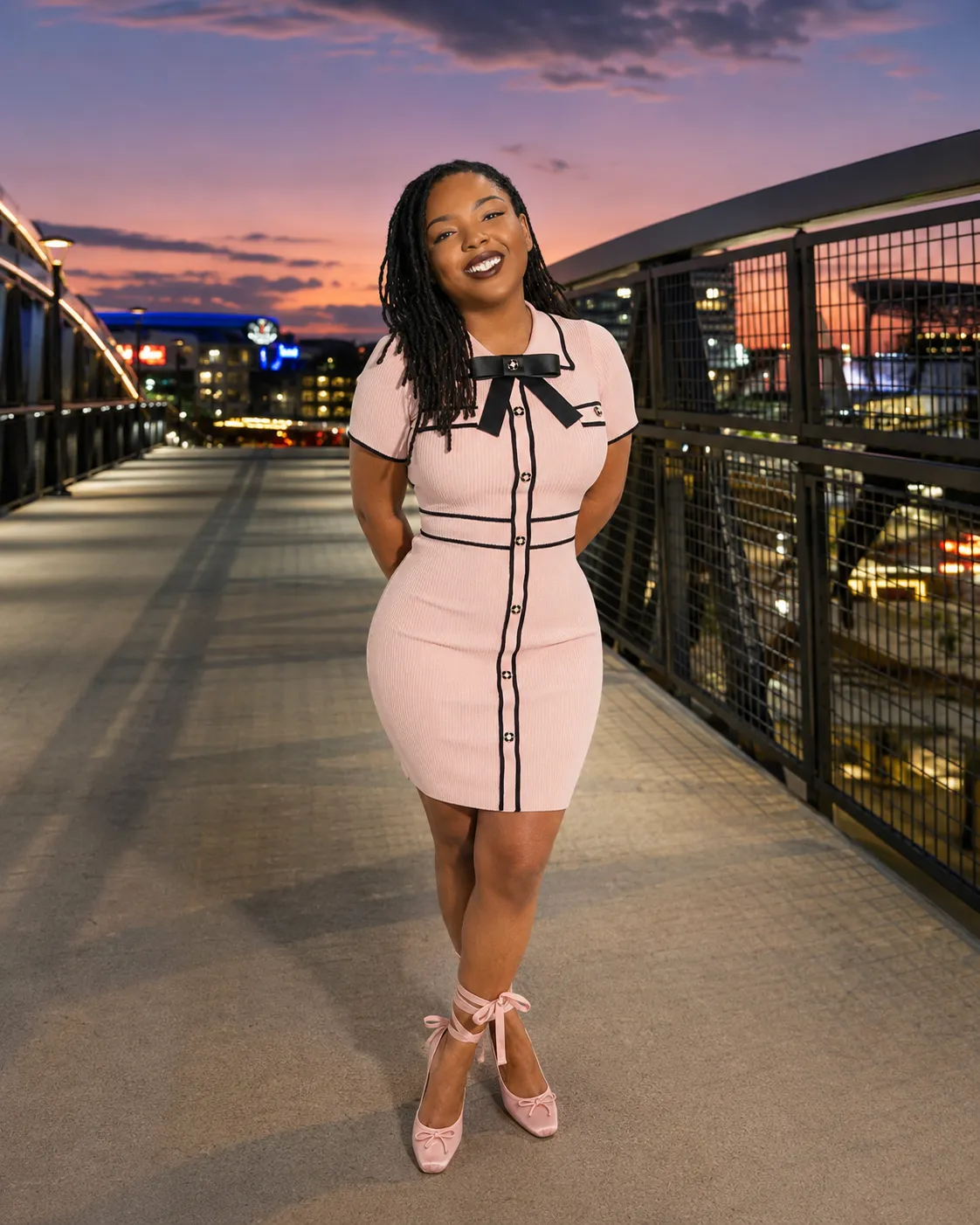 Moremi Wolcott on the Battery Atlanta pedestrian bridge, serving military families and relocation clients across Georgia